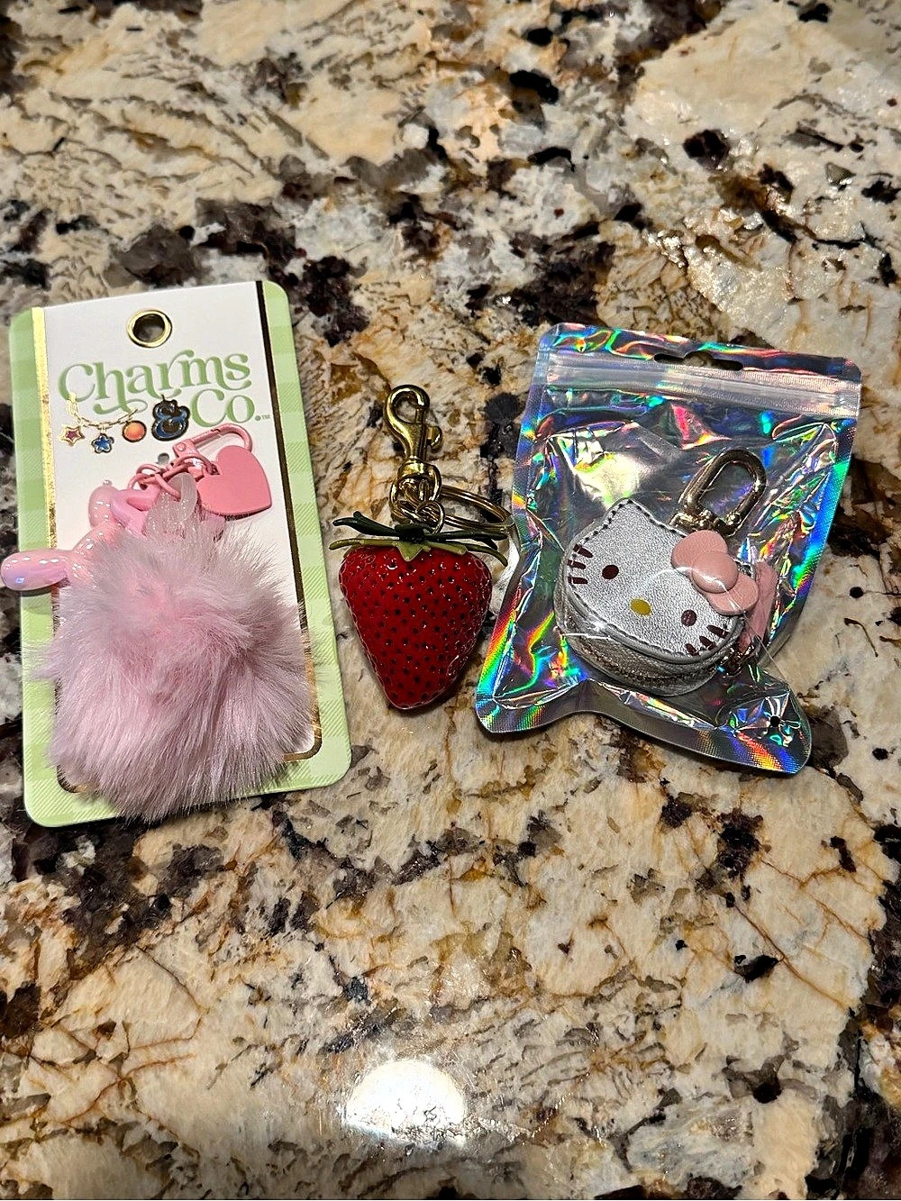 Charms & Co. Hello Kitty pouch and strawberry keychain charm set. Pink & Red NWT